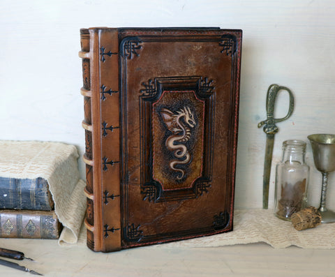 Large vintage leather journal, Tooled decoration with Dragon and Sword. Tea stained pages. "The Force within You"