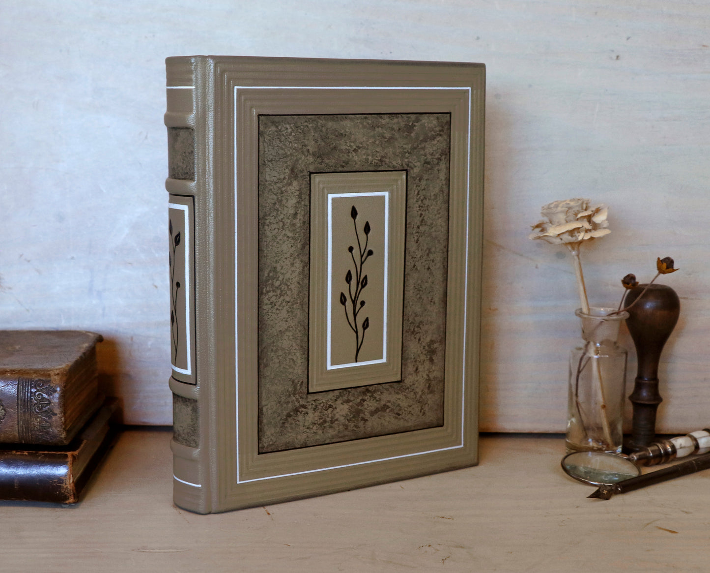 Beige leather journal with tooled floral decoration. Echoes of Earth. One of a kind.