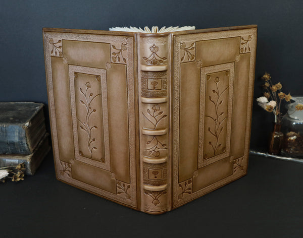 Beige leather journal with tooled floral decoration. Romantic Journey. One of a Kind.