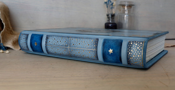 Light blue leather journal with gold tooled decoration, The Circle of Time