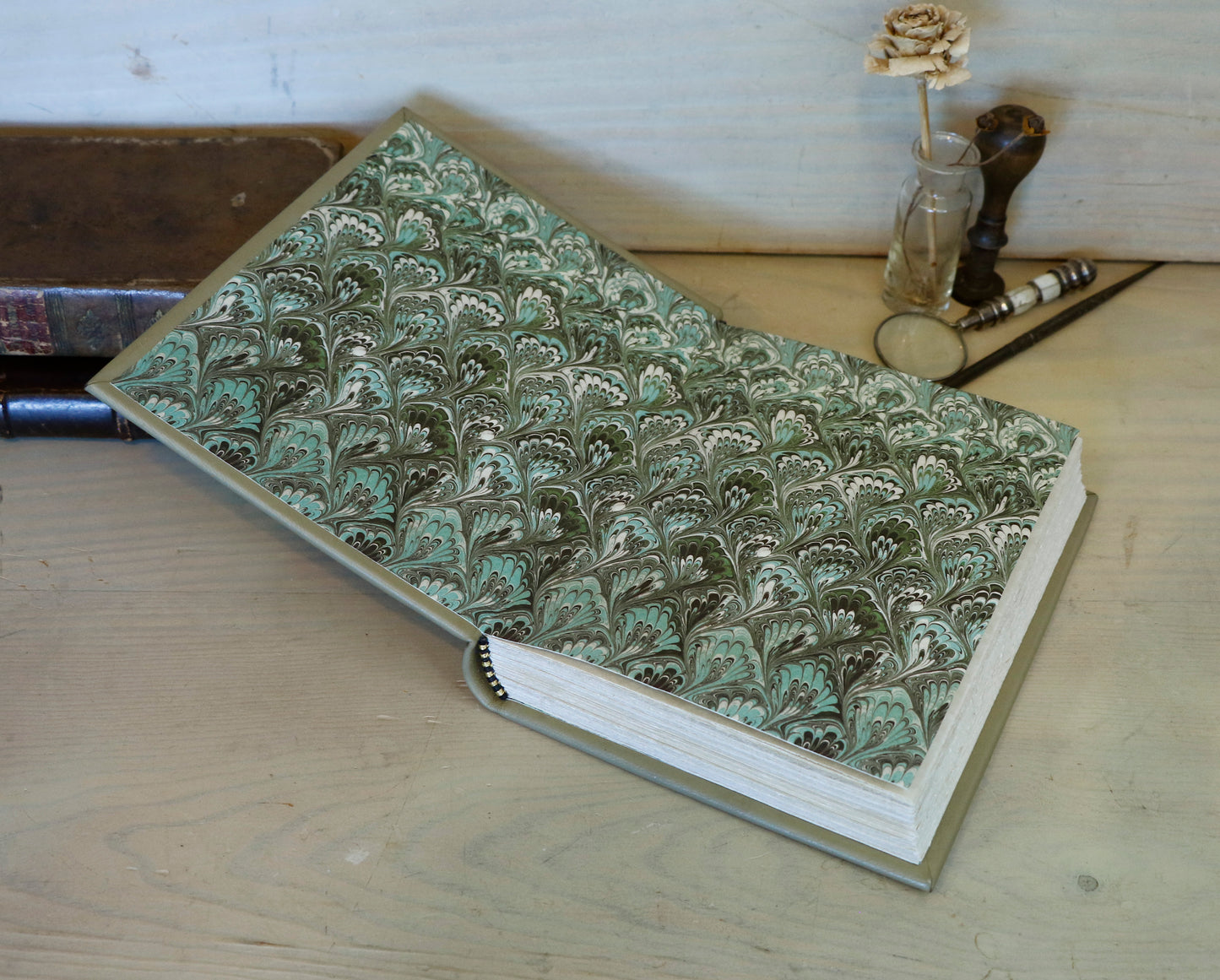 Beige leather journal with tooled floral decoration. Echoes of Earth. One of a kind.
