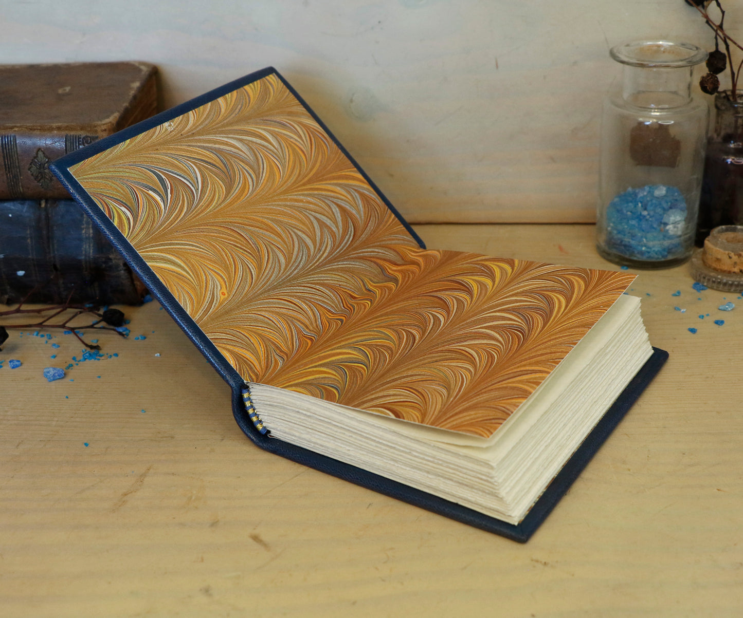 Blue leather journal with gold tooled decoration. Scarab of the Night