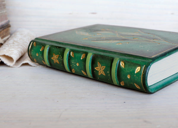 Green Leather Journal with gold floral decoration. Romantic Journey