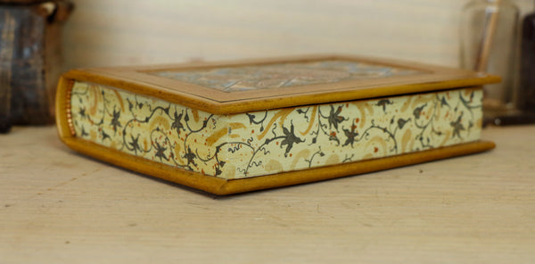 Leather journal with hand painted illuminated miniature on vellum and gold tooled decoration - Pelican Feeding Her Young