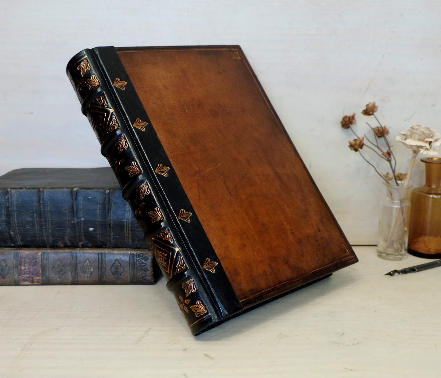 Antiqued leather journal, brown leather, Gold tooled decoration. Once Upon a Time
