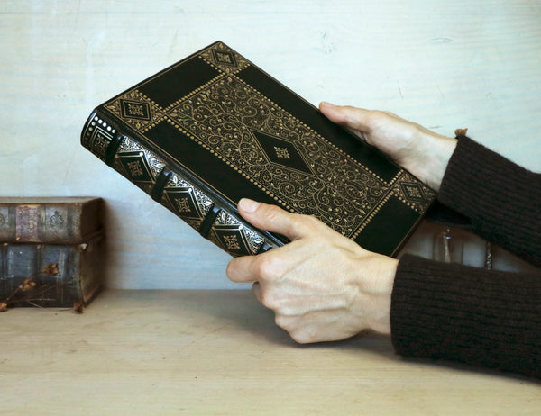 Black Leather Journal with gold floral decoration. Chronicles of the Soul
