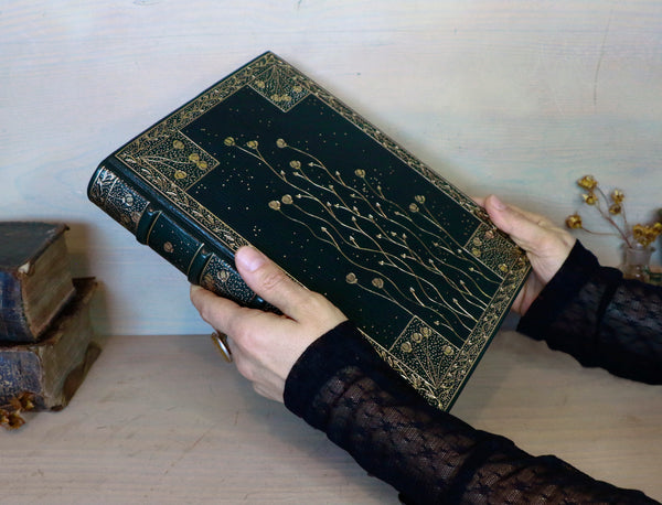 Dark Green Leather Journal with gold floral decoration. Romantic Journey