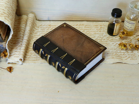 Vintage leather journal with tooled decoration - A Small Treasure
