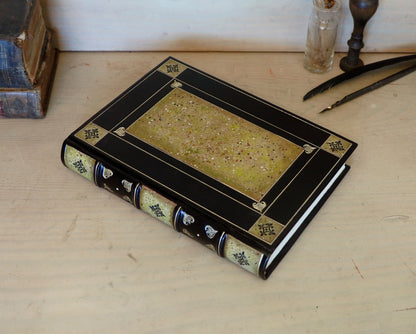 Black leather journal with tooled and hand painted decoration. Artist paper. Verdigris Dreams