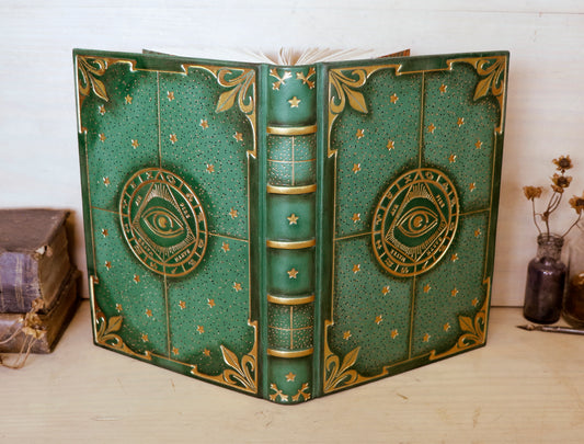 Green leather journal with gold tooled decoration, The Circle of Time
