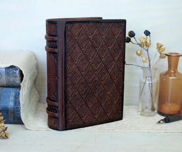 Brown leather journal with blind tooled decoration, Tea stained pages. Dark Chocolate