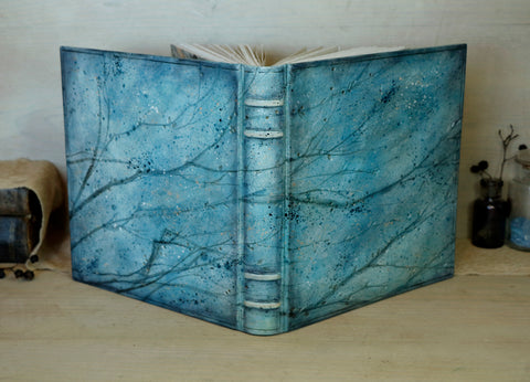 Light blue leather journal with tooled and painted decoration. One of a kind. Azure Mist