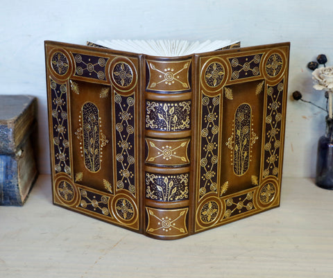 Brown leather journal with gold tooled decoration, The Golden Bloom