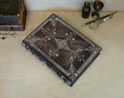 Grey Leather Journal with Silver tooled floral decoration. Moonlight Song