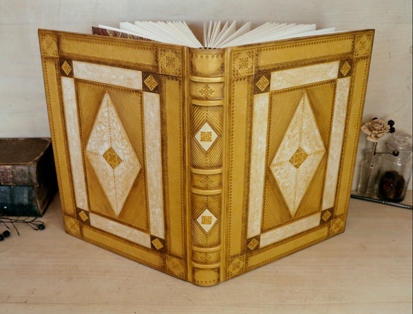 Antiqued yellow leather journal with tooled decoration. Romantic Sunset II