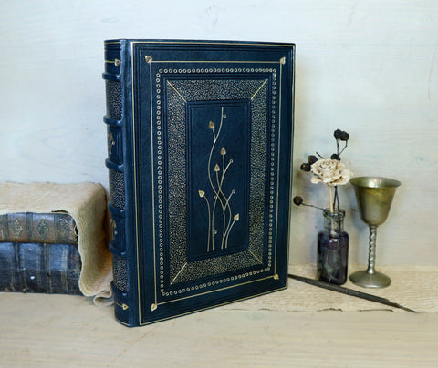 Dark Blue Leather Journal with gold floral decoration. The Midnight Garden