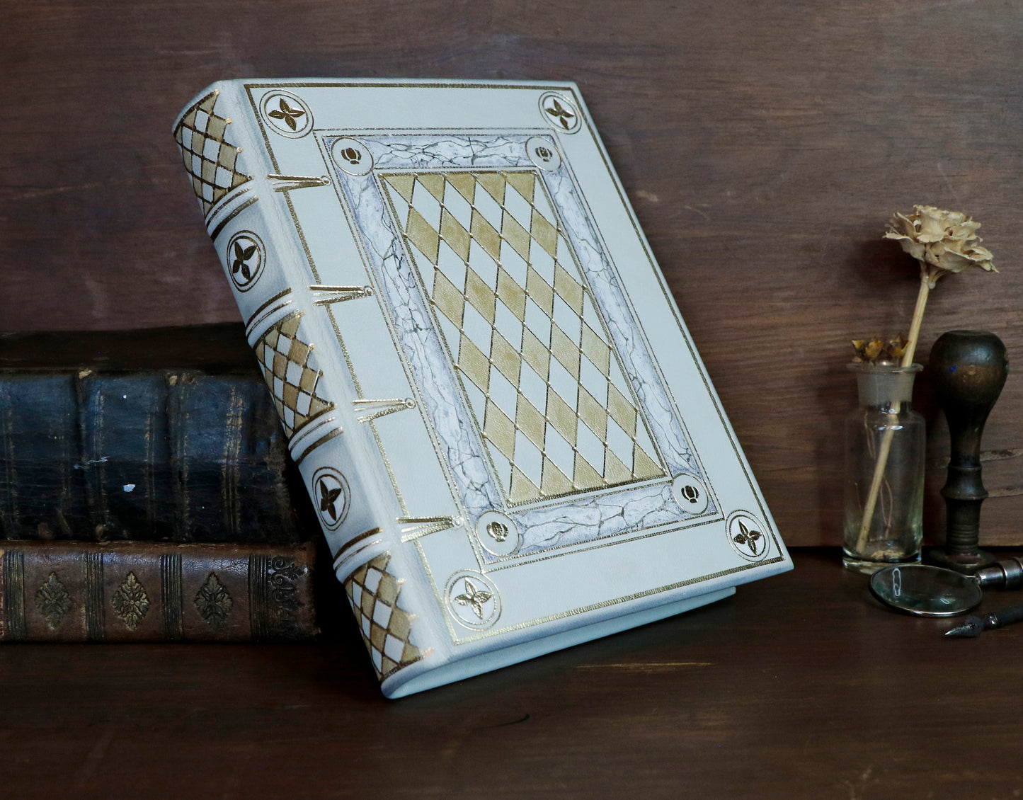 Ivory Dreams. White leather journal with gold tooled and painted decoration. One of a kind.