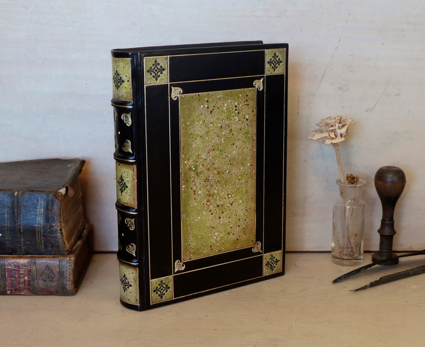 Black leather journal with tooled and hand painted decoration. Artist paper. Verdigris Dreams