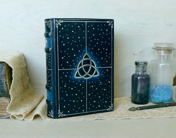 Dark blue leather journal with Silver tooled decoration and Painted edges - Magic Triquetra