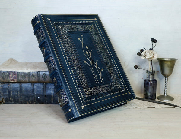 Dark Blue Leather Journal with gold floral decoration. The Midnight Garden