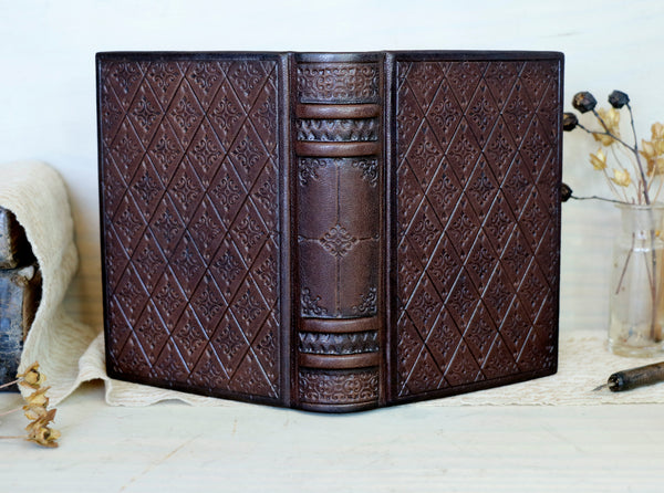 Brown leather journal with blind tooled decoration, Tea stained pages. Dark Chocolate