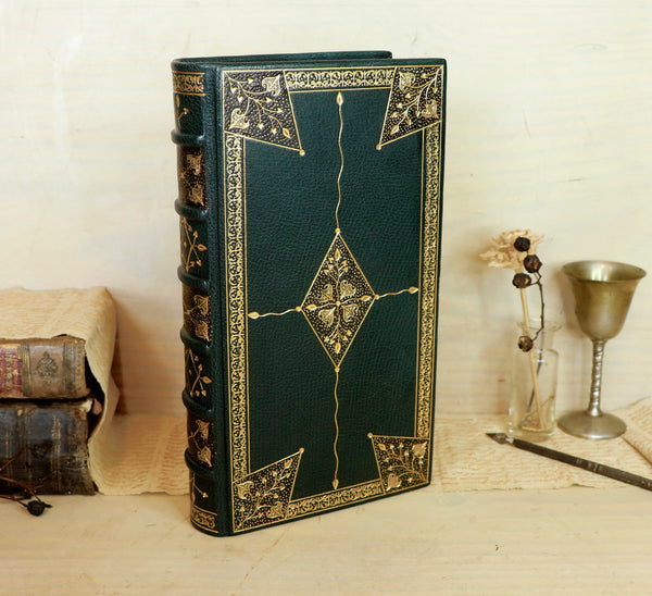 Dark Green Leather Journal with gold floral decoration. Romantic Journey