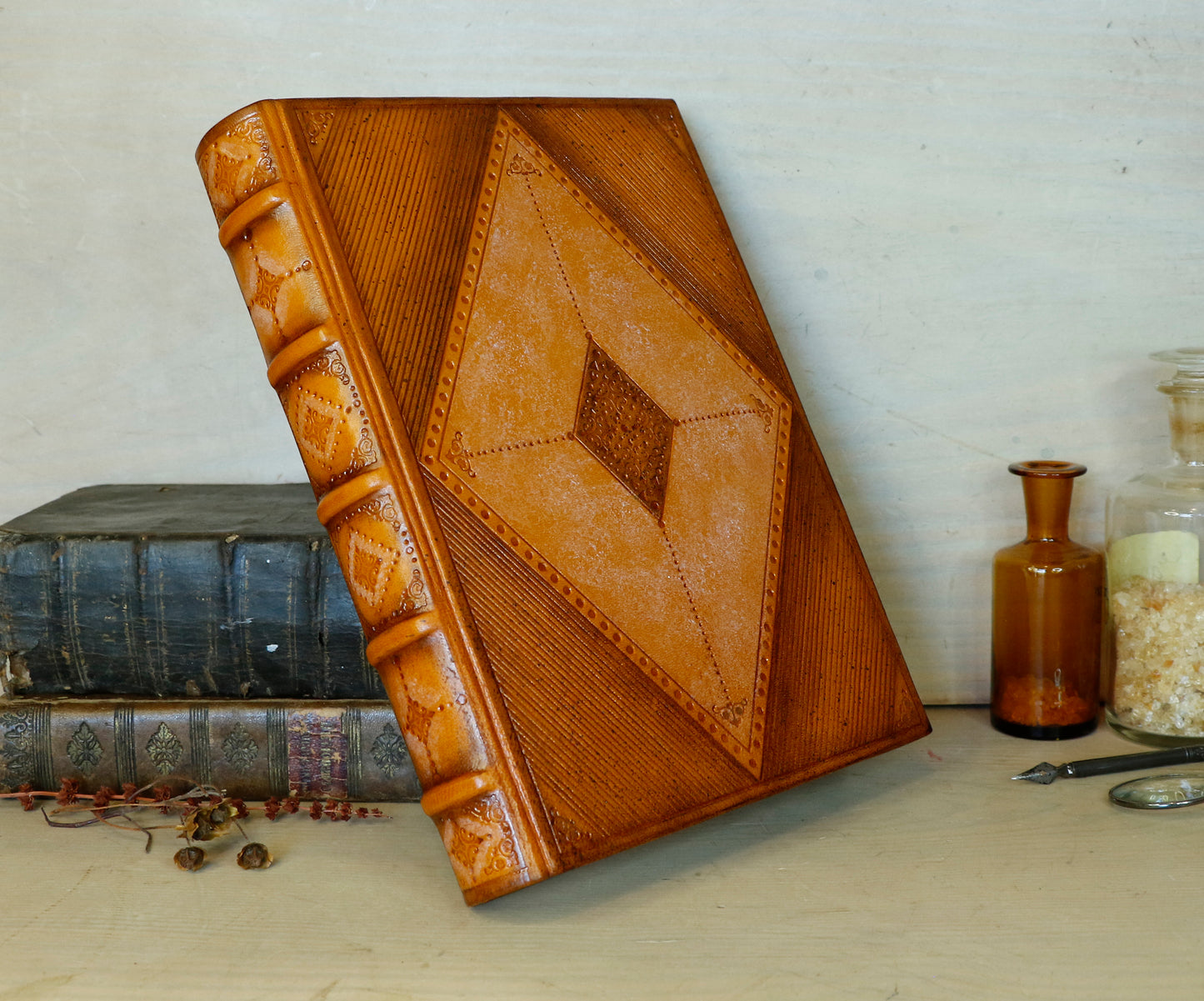 Antiqued orange leather journal with tooled decoration. Romantic Sunset II