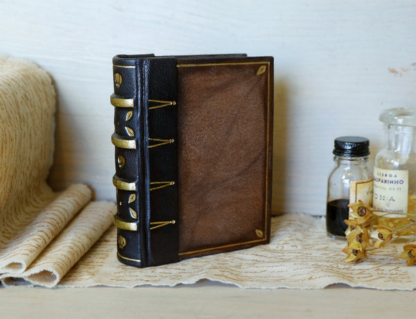 Vintage leather journal with tooled decoration - A Small Treasure