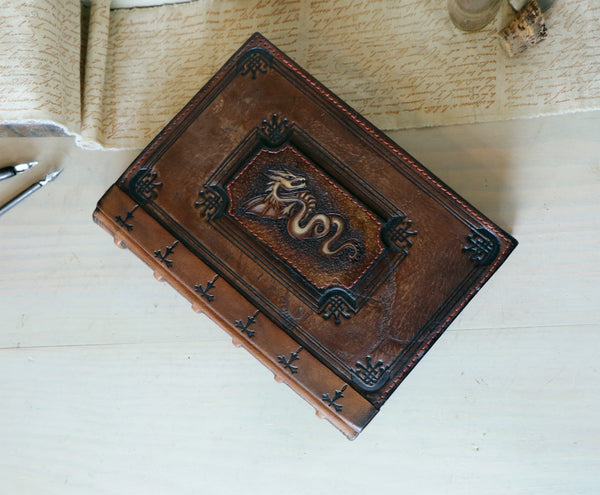 Large vintage leather journal, Tooled decoration with Dragon and Sword. Tea stained pages. "The Force within You"