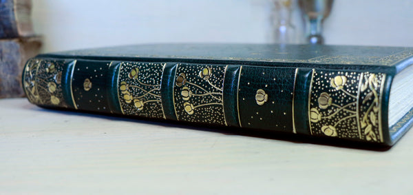 Dark Green Leather Journal with gold floral decoration. Romantic Journey