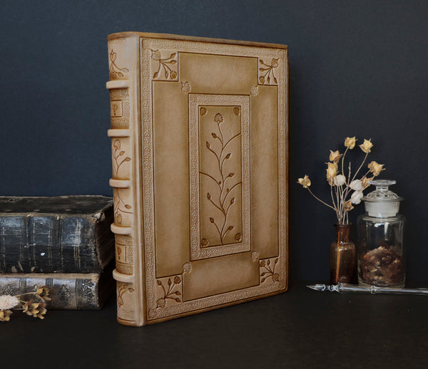 Beige leather journal with tooled floral decoration. Romantic Journey. One of a Kind.