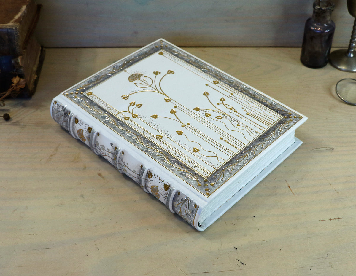 Ivory Dreams. White leather journal with gold and silver tooled decoration. One of a kind.