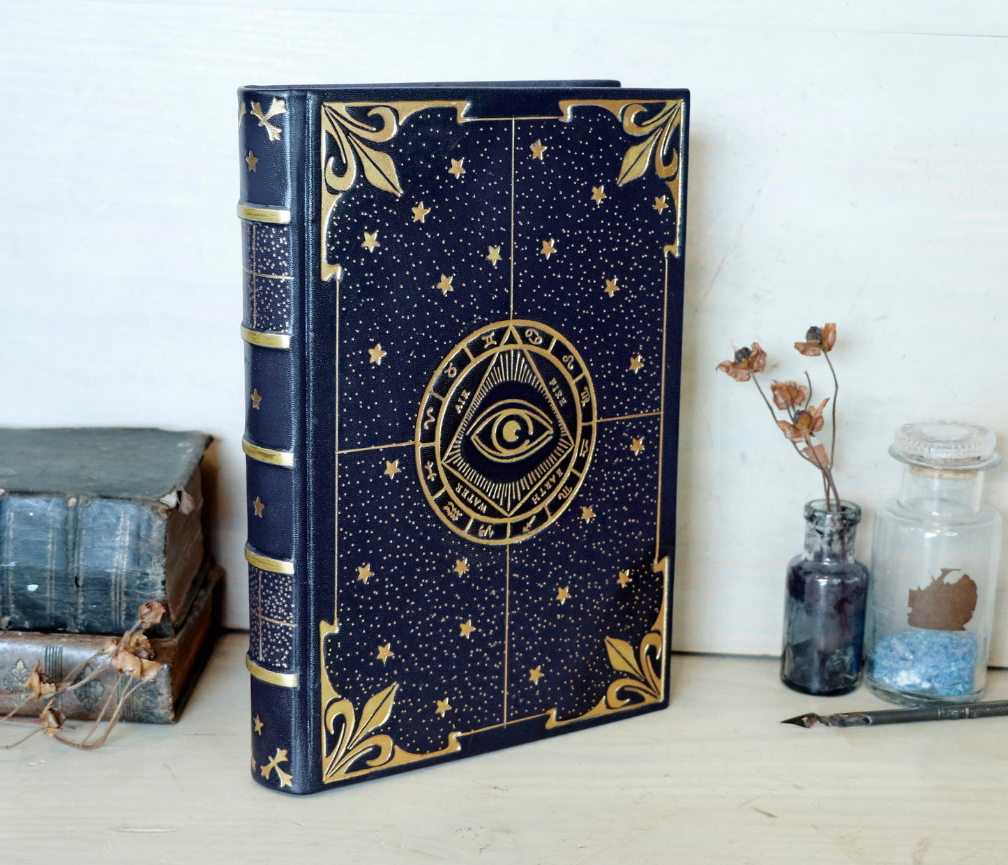 Dark blue leather journal with gold tooled decoration, The Circle of Time