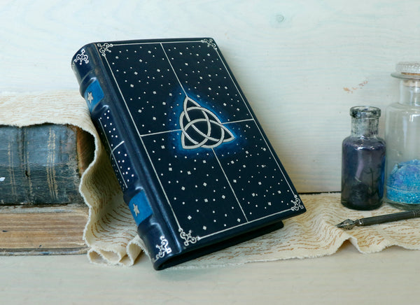 Dark blue leather journal with Silver tooled decoration and Painted edges - Magic Triquetra