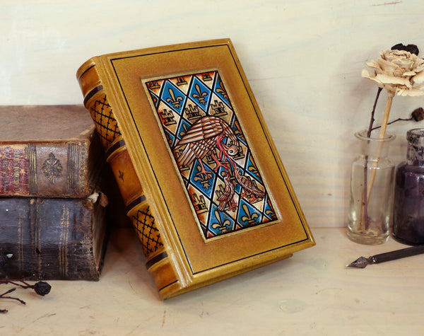 Leather journal with hand painted illuminated miniature on vellum and gold tooled decoration - Pelican Feeding Her Young