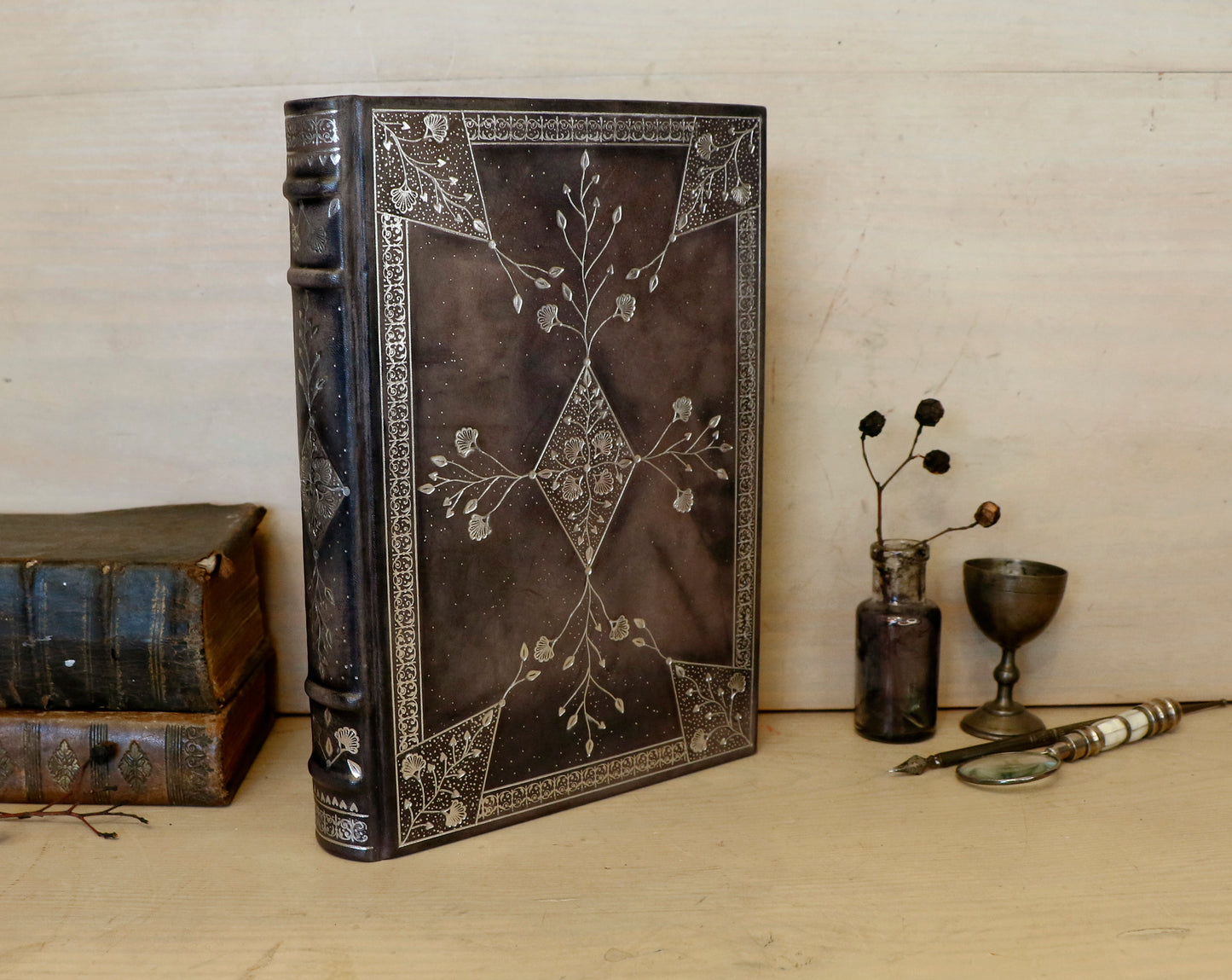 Grey Leather Journal with Silver tooled floral decoration. Moonlight Song