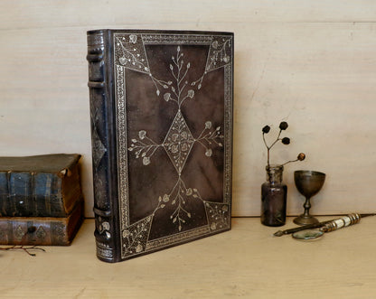 Grey Leather Journal with Silver tooled floral decoration. Moonlight Song