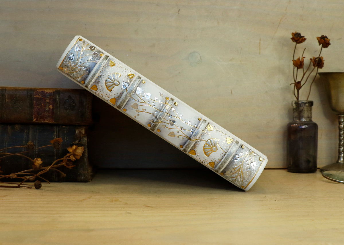 Ivory Dreams. White leather journal with gold and silver tooled decoration. One of a kind.