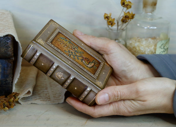 Small leather journal with painted Illuminated miniature and gold tooled decoration - Aristologia and the Green Dragon
