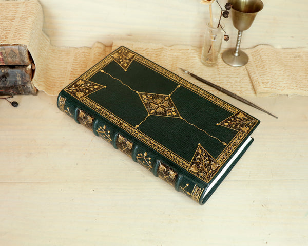 Dark Green Leather Journal with gold floral decoration. Romantic Journey