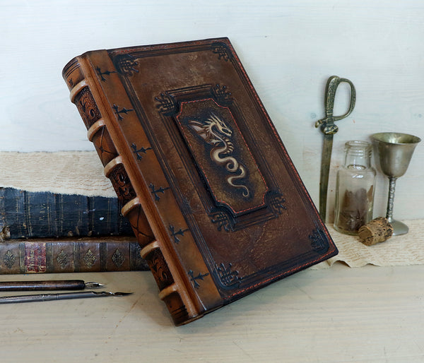 Large vintage leather journal, Tooled decoration with Dragon and Sword. Tea stained pages. "The Force within You"