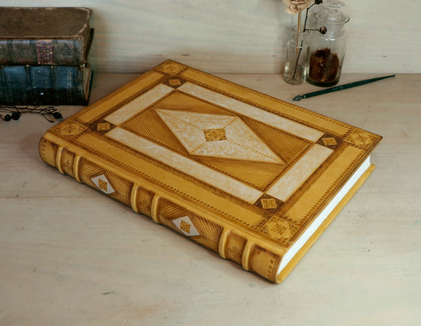 Antiqued yellow leather journal with tooled decoration. Romantic Sunset II