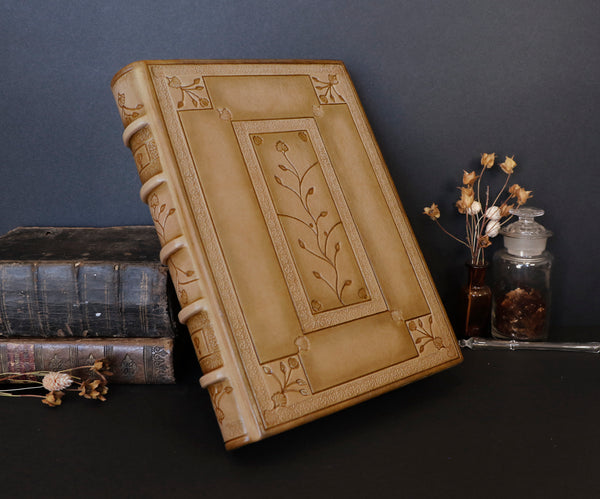 Beige leather journal with tooled floral decoration. Romantic Journey. One of a Kind.