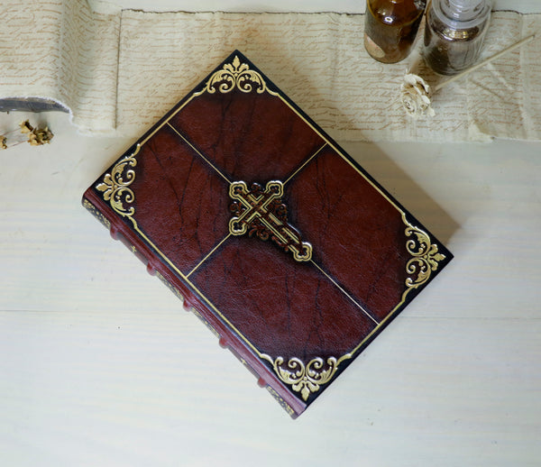 Antiqued red leather journal with cross decoration. One of a Kind - Faith