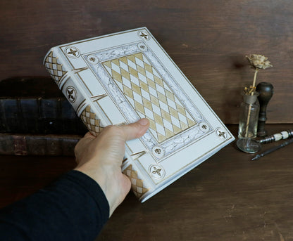 Ivory Dreams. White leather journal with gold tooled and painted decoration. One of a kind.