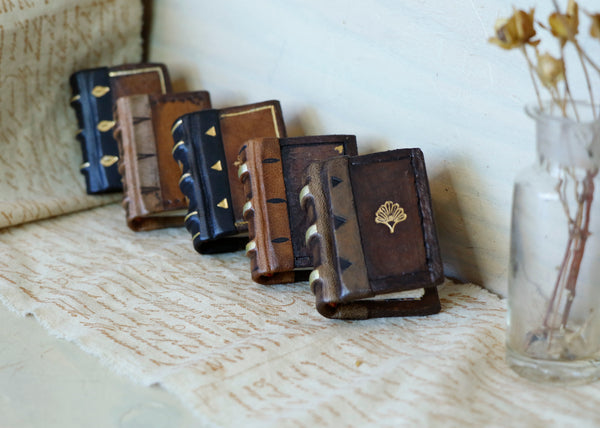 Miniature journal, vintage leather with tooled decoration. One Tiny Book