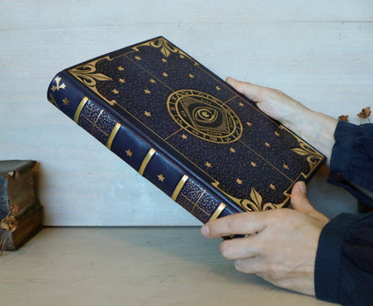Dark blue leather journal with gold tooled decoration, The Circle of Time