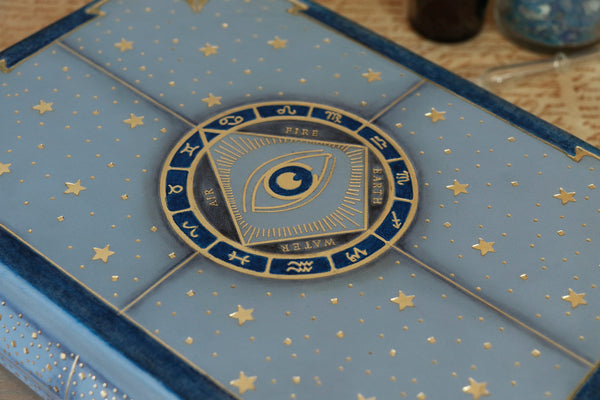 Light blue leather journal with gold tooled decoration, The Circle of Time