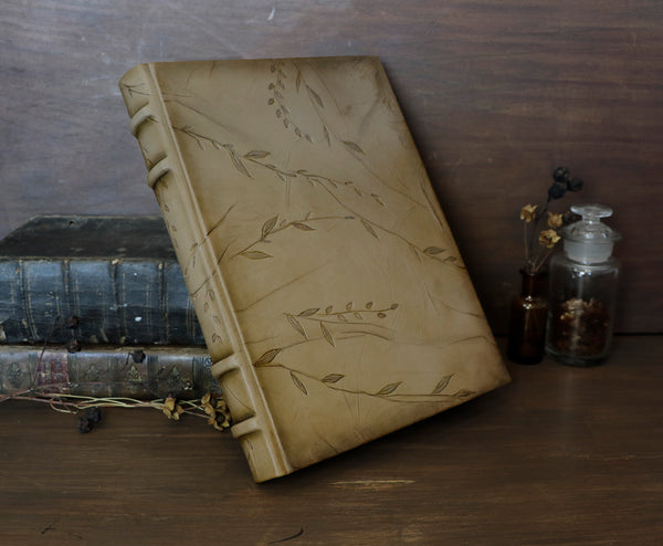 Natural leather journal with tooled floral decoration. One of a kind. Return to Nature