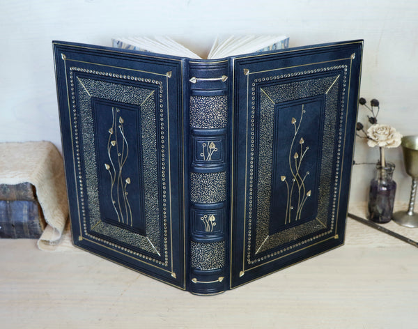 Dark Blue Leather Journal with gold floral decoration. The Midnight Garden